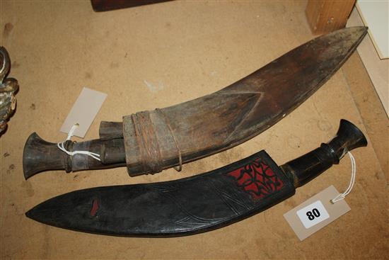 Gurkha kukri in leather sheath & another kukri with 2 skining knives & wooden sheath (a.f)